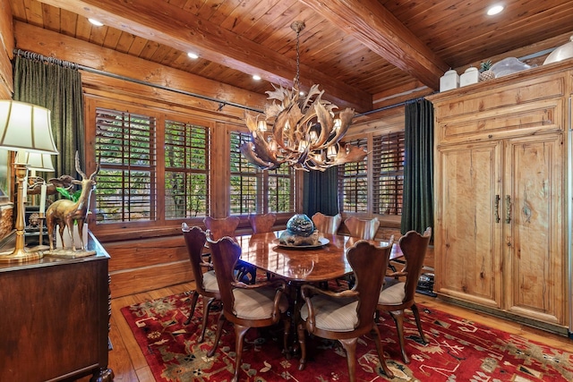 10351 N Gibson Rd, Hayden, ID 83835 - dining room with hardwood / wood-style flooring, a chandelier, recessed lighting, wooden ceiling, and beamed ceiling
