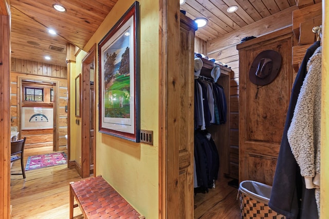 10351 N Gibson Rd, Hayden, ID 83835 - corridor with wooden ceiling, hardwood / wood-style floors, wood walls, and recessed lighting
