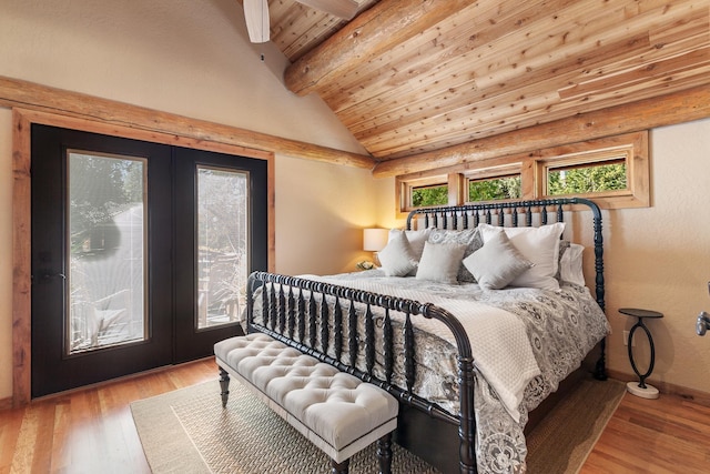 10351 N Gibson Rd, Hayden, ID 83835 - bedroom featuring french doors, wooden ceiling, wood finished floors, and baseboards