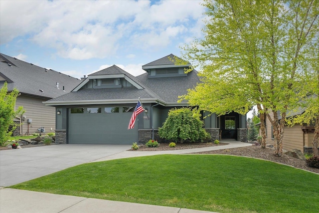 2114 E Cherrytree Ln, Spokane, WA 99203 - craftsman house with roof with shingles, stone siding, driveway, a front yard, and a garage