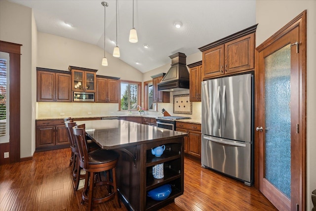 2114 E Cherrytree Ln, Spokane, WA 99203 - kitchen with appliances with stainless steel finishes, premium range hood, dark wood-style floors, tasteful backsplash, and lofted ceiling