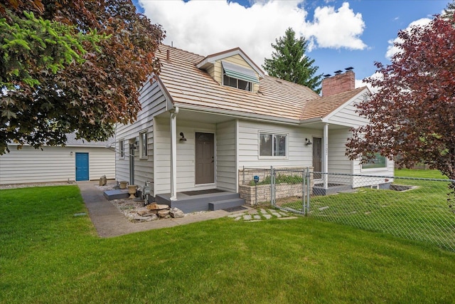 11707 E Broadway Ave, Spokane, WA 99206 - view of front facade featuring a chimney and a gate