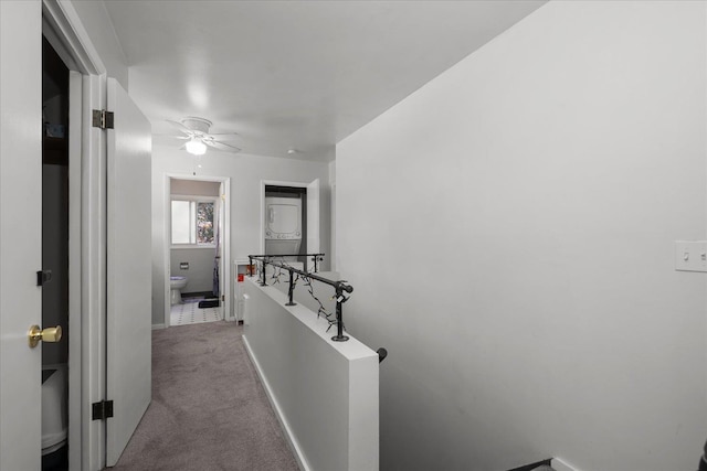 11707 E Broadway Ave, Spokane, WA 99206 - hall featuring an upstairs landing, carpet flooring, and baseboards