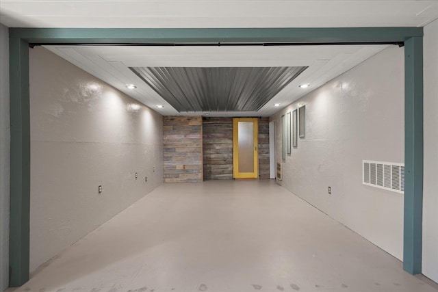 11707 E Broadway Ave, Spokane, WA 99206 - finished basement featuring wood walls, recessed lighting, and a textured wall