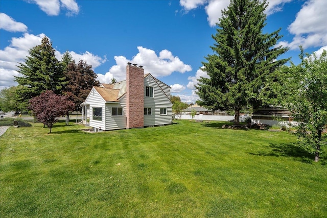 11707 E Broadway Ave, Spokane, WA 99206 - back of house featuring a chimney
