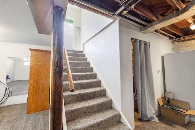 stairway with carpet floors