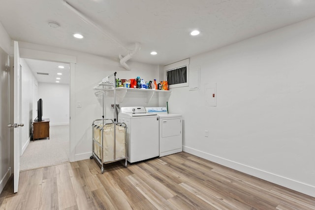 16814 N Tamarac Ln, Nine Mile Falls, WA 99026 - washroom featuring washer and clothes dryer, light wood-style floors, baseboards, and recessed lighting