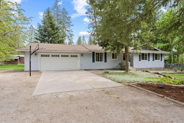 16814 N Tamarac Ln, Nine Mile Falls, WA 99026 - ranch-style home featuring driveway and an attached garage
