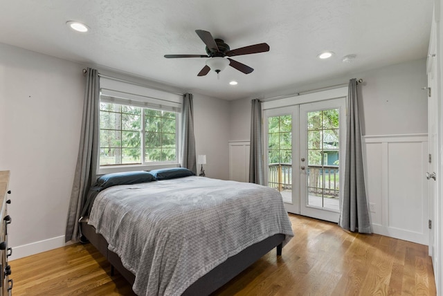 16814 N Tamarac Ln, Nine Mile Falls, WA 99026 - bedroom with access to exterior, wood finished floors, recessed lighting, and a ceiling fan