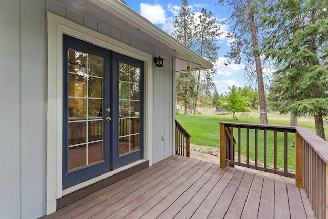 16814 N Tamarac Ln, Nine Mile Falls, WA 99026 - wooden terrace featuring french doors and a lawn