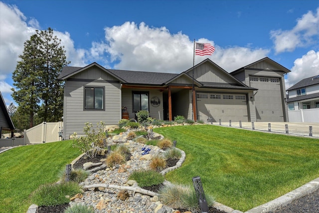 25523 N N Sheridan Rd, Chattaroy, WA 99003 - single story home featuring board and batten siding, an attached garage, and driveway