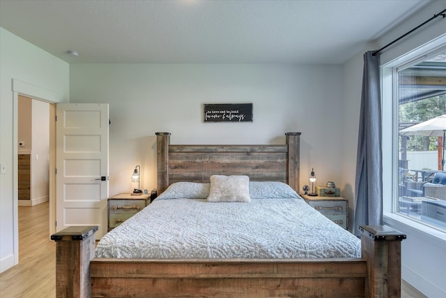 25523 N N Sheridan Rd, Chattaroy, WA 99003 - bedroom with wood finished floors and baseboards