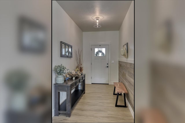 25523 N N Sheridan Rd, Chattaroy, WA 99003 - entrance foyer with light wood finished floors and baseboards