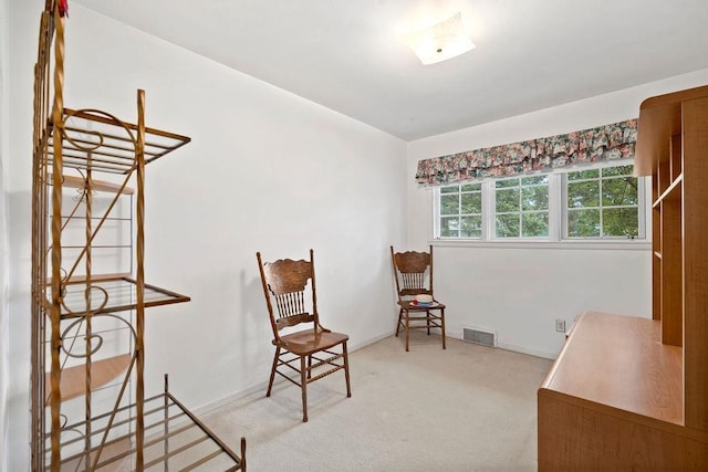 823 N Woodlawn Rd, Spokane Valley, WA 99216 - living area featuring light colored carpet and baseboards