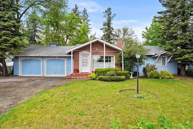 823 N Woodlawn Rd, Spokane Valley, WA 99216 - ranch-style house with a chimney, concrete driveway, a garage, a front lawn, and brick siding