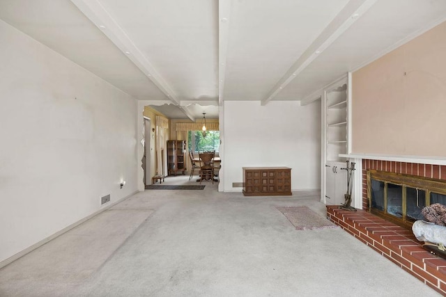 823 N Woodlawn Rd, Spokane Valley, WA 99216 - living area with carpet floors, a brick fireplace, baseboards, and a chandelier