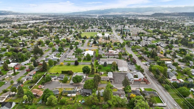 823 N Woodlawn Rd, Spokane Valley, WA 99216 - aerial overview of property's location featuring a mountainous background