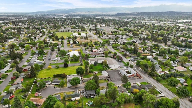 823 N Woodlawn Rd, Spokane Valley, WA 99216 - aerial view of property's location featuring mountains and nearby suburban area