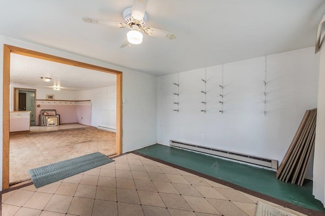 47 Davis Lake Ln, Usk, WA 99180 - spare room with a baseboard heating unit and a ceiling fan