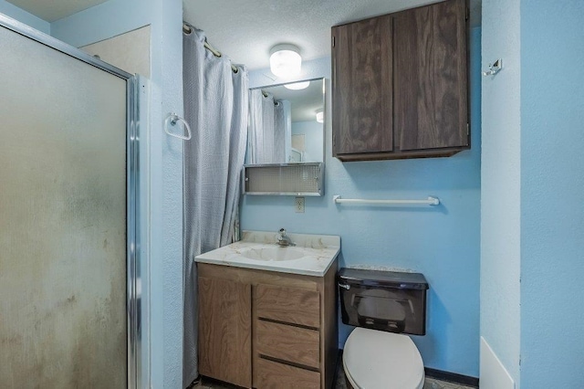 47 Davis Lake Ln, Usk, WA 99180 - full bath with a stall shower, vanity, and toilet