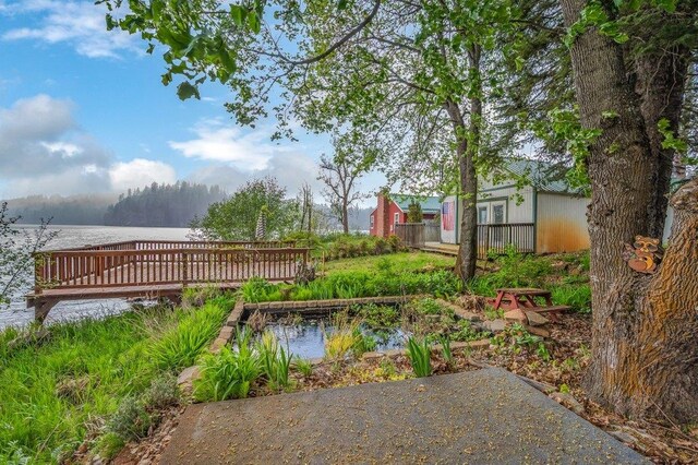 47 Davis Lake Ln, Usk, WA 99180 - view of yard with a deck
