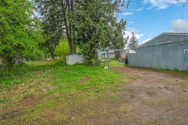 47 Davis Lake Ln, Usk, WA 99180 - view of yard with an outbuilding, a pole building, and a storage unit