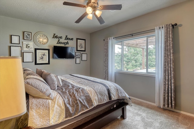 10812 N Fleetwood Ct, Spokane, WA 99208 - bedroom with carpet flooring, baseboards, and ceiling fan