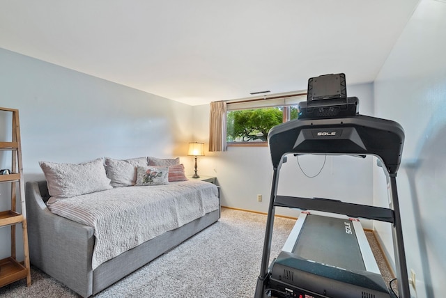 carpeted bedroom with baseboards