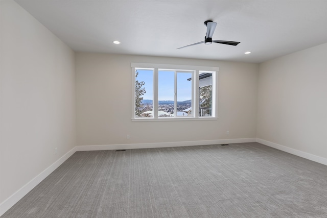 7285 E Columbia Dr, Spokane, WA 99212 - spare room with a ceiling fan, baseboards, carpet, and recessed lighting