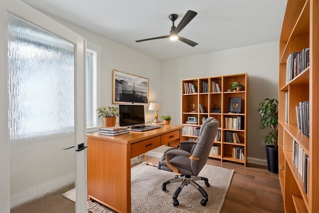 7285 E Columbia Dr, Spokane, WA 99212 - office with healthy amount of natural light, a ceiling fan, and wood finished floors