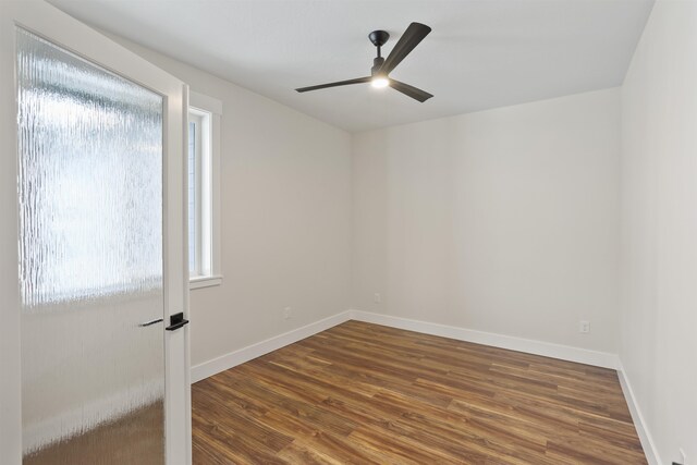 7285 E Columbia Dr, Spokane, WA 99212 - empty room with healthy amount of natural light, a ceiling fan, wood finished floors, and baseboards