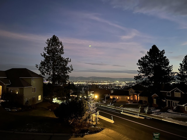 7285 E Columbia Dr, Spokane, WA 99212 - view of asphalt road featuring curbs and sidewalks