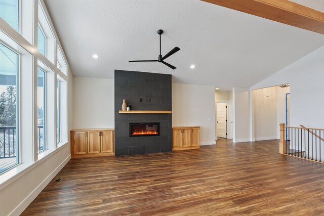 7285 E Columbia Dr, Spokane, WA 99212 - unfurnished living room with lofted ceiling, healthy amount of natural light, a ceiling fan, wood finished floors, and recessed lighting