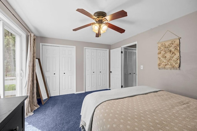 113 W Florence Ave, Spokane, WA 99218 - carpeted bedroom with multiple closets and a ceiling fan