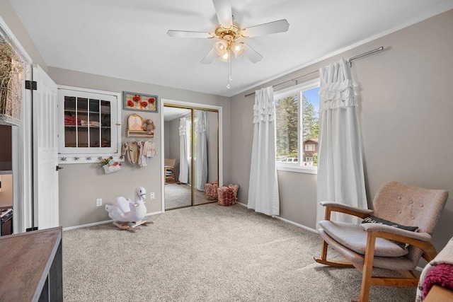 113 W Florence Ave, Spokane, WA 99218 - living area featuring ceiling fan, carpet flooring, and baseboards