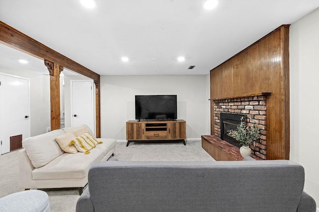 113 W Florence Ave, Spokane, WA 99218 - living area with light colored carpet, recessed lighting, a fireplace, and baseboards