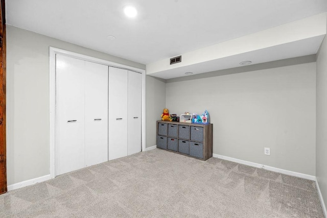 113 W Florence Ave, Spokane, WA 99218 - carpeted bedroom featuring baseboards and a closet