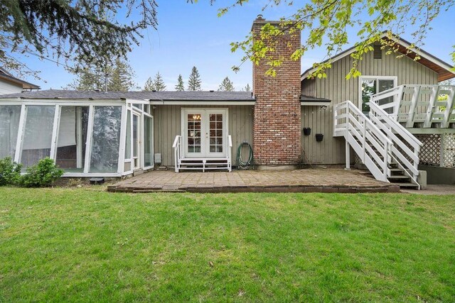 113 W Florence Ave, Spokane, WA 99218 - rear view of property with french doors, a sunroom, a patio, stairway, and a wooden deck