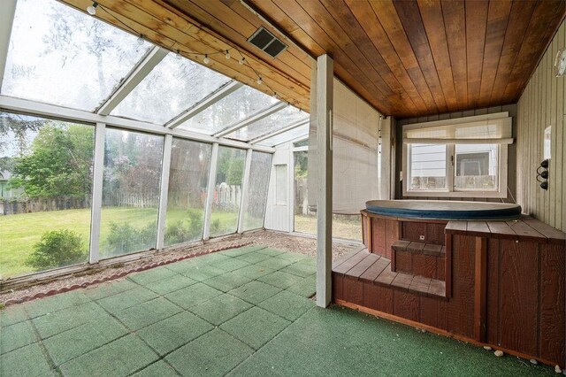 113 W Florence Ave, Spokane, WA 99218 - unfurnished sunroom with a hot tub and plenty of natural light