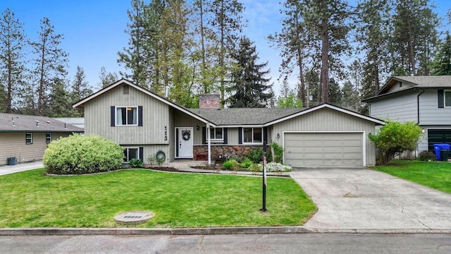 113 W Florence Ave, Spokane, WA 99218 - tri-level home with an attached garage, a front yard, concrete driveway, and a chimney