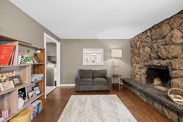 113 W Florence Ave, Spokane, WA 99218 - living area featuring wood finished floors and a fireplace
