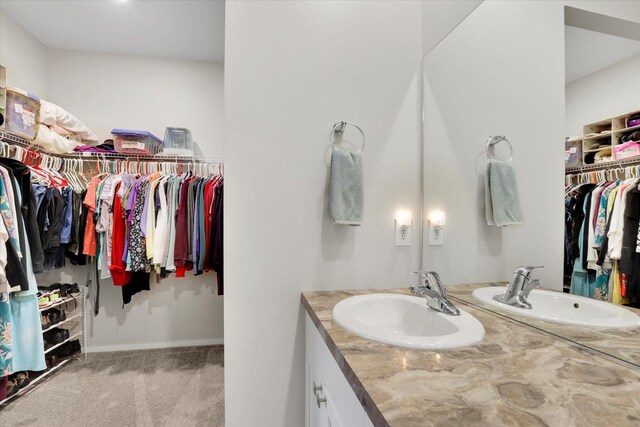 5704 W Jamestown Ln, Spokane, WA 99208 - bathroom featuring a spacious closet and vanity