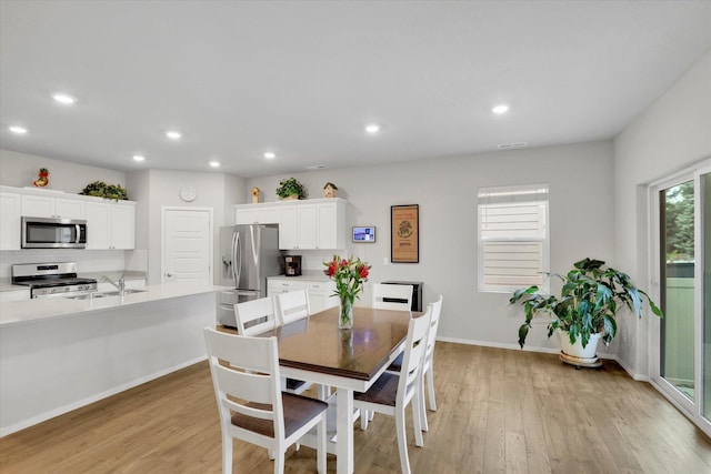 5704 W Jamestown Ln, Spokane, WA 99208 - dining room featuring light wood-style flooring, recessed lighting, and baseboards