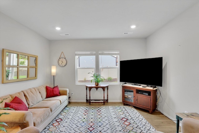 5704 W Jamestown Ln, Spokane, WA 99208 - living room with light wood-style floors, recessed lighting, and baseboards