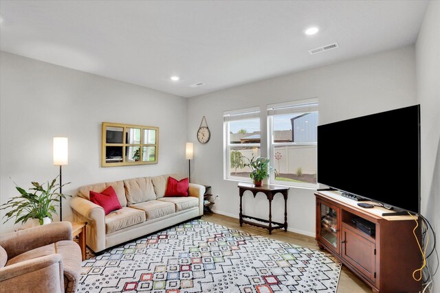 5704 W Jamestown Ln, Spokane, WA 99208 - living room featuring light wood finished floors, recessed lighting, and baseboards