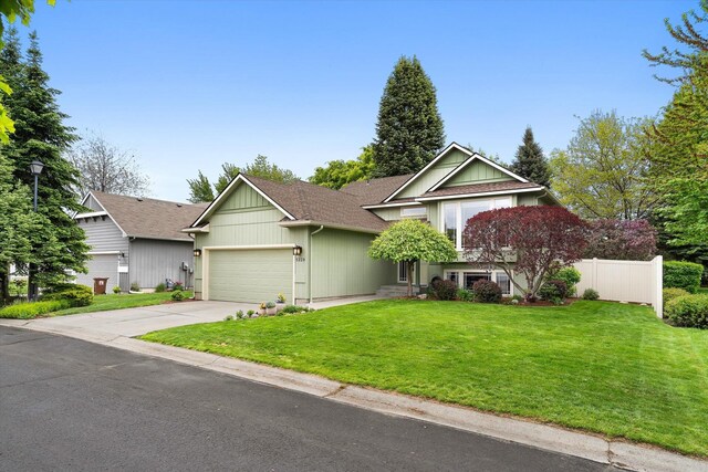 5229 S Altamont Ln, Spokane, WA 99223 - view of front of home featuring an attached garage, concrete driveway, and a shingled roof