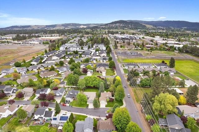 5229 S Altamont Ln, Spokane, WA 99223 - aerial view of property and surrounding area featuring a mountain backdrop and nearby suburban area