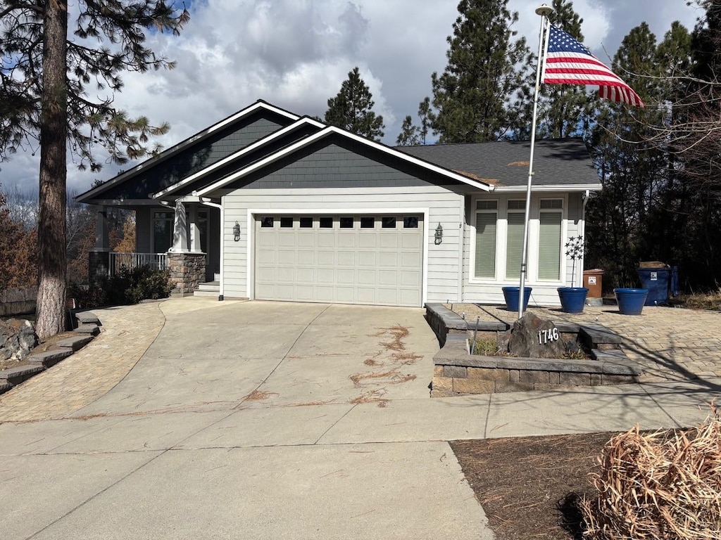 view of front facade featuring driveway and a garage