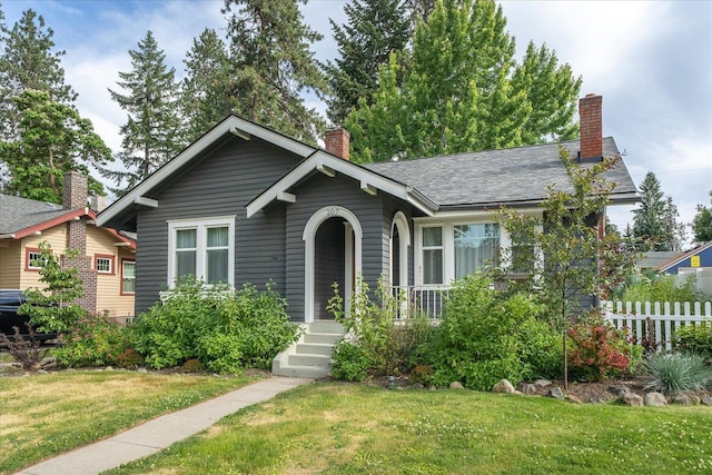 207 W 27th Ave, Spokane, WA 99203 - view of front of property with a chimney and a porch