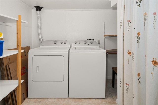 207 W 27th Ave, Spokane, WA 99203 - laundry room featuring washer and clothes dryer and light tile patterned floors